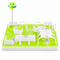 Modular green and white cat treat maze on white