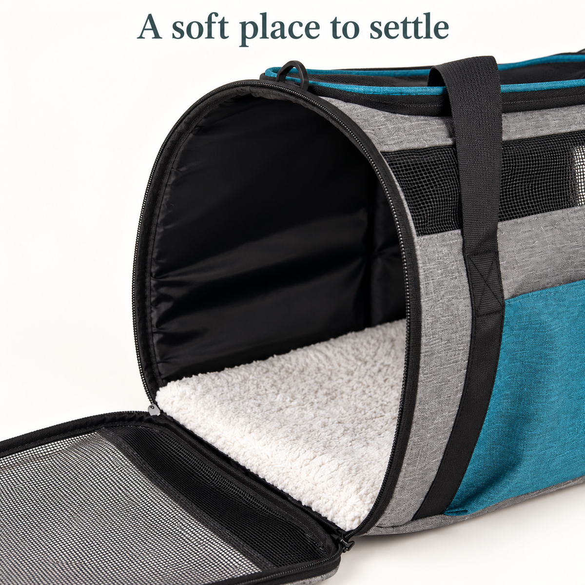 Fleece pad and entrance detail of blue-grey pet carrier