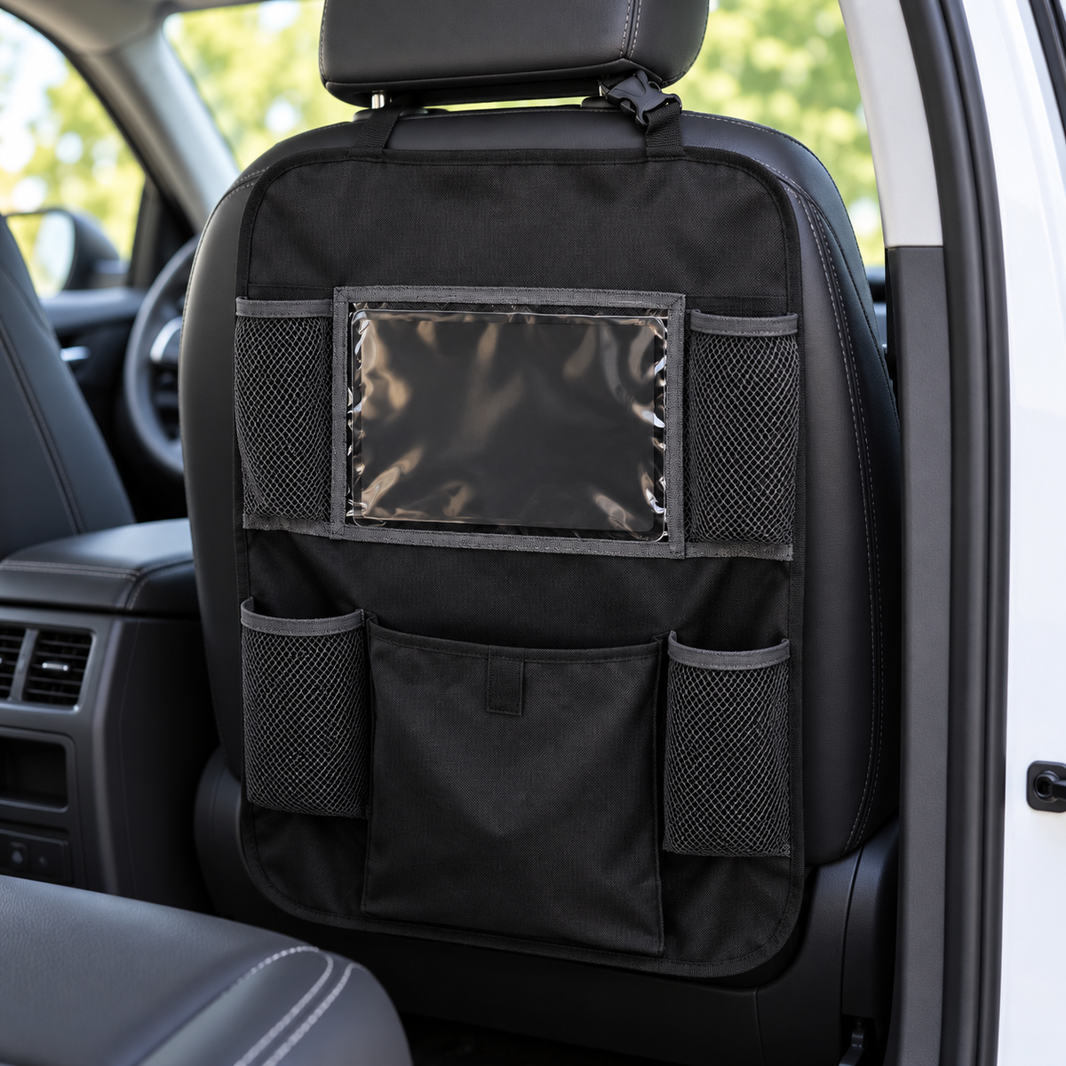 Nuby Backseat Organizer with Tablet Pocket & Removable Pouch — in use