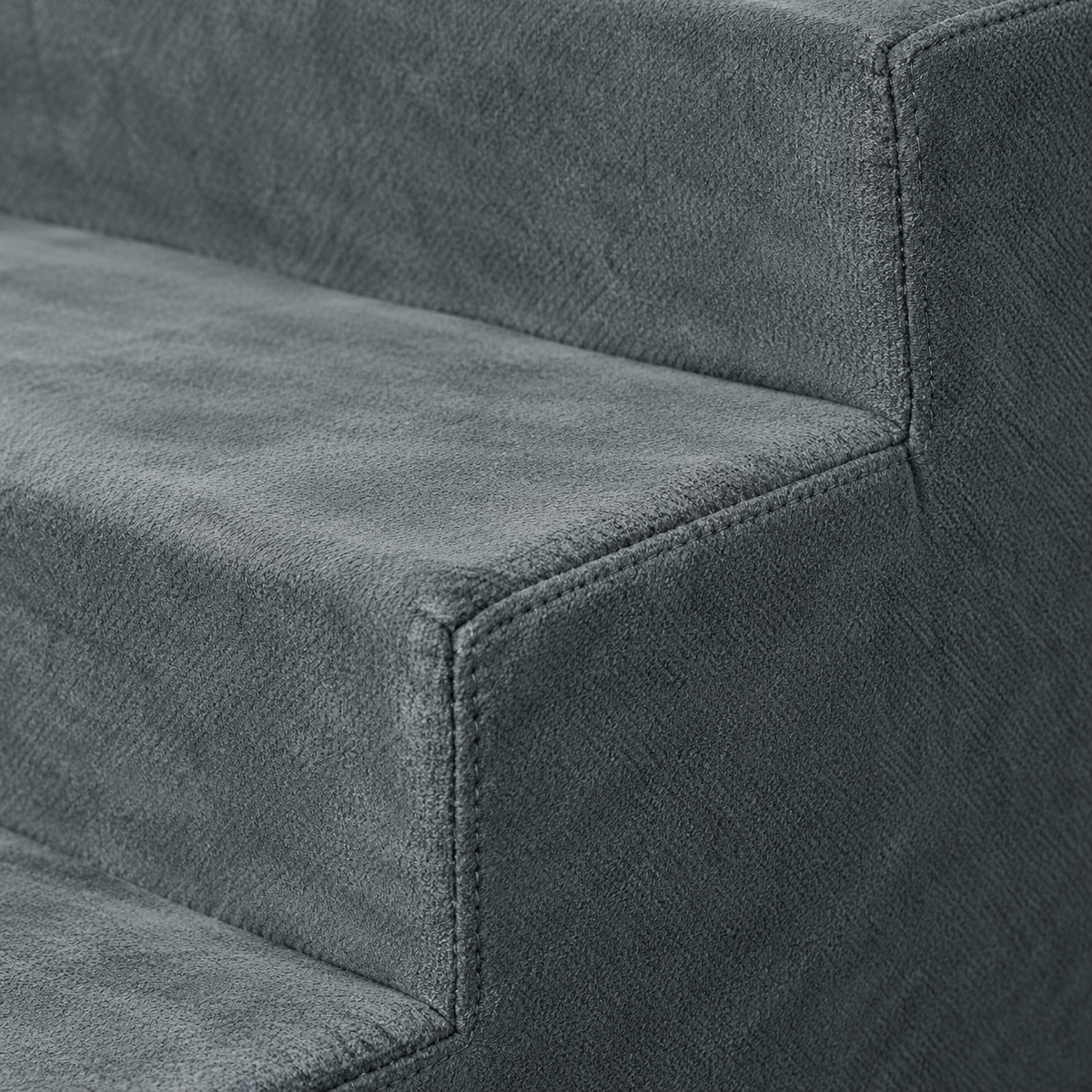 Grey microfiber cover and stitched tread edge of PETMAKER cat stairs
