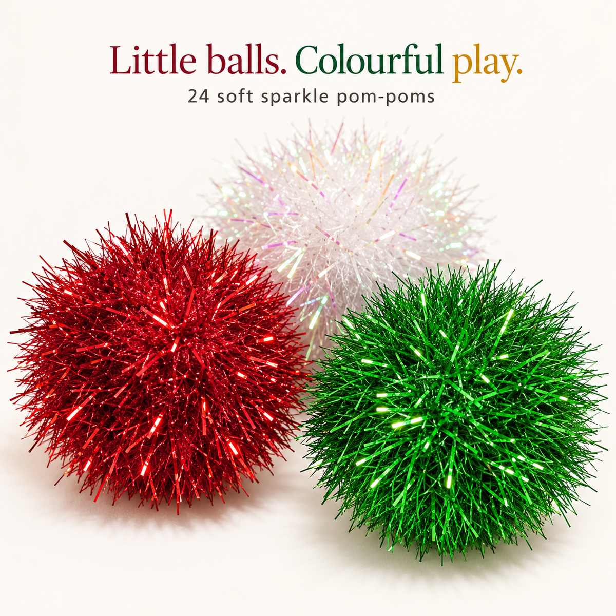 Close-up of soft colourful sparkle pom-pom cat balls
