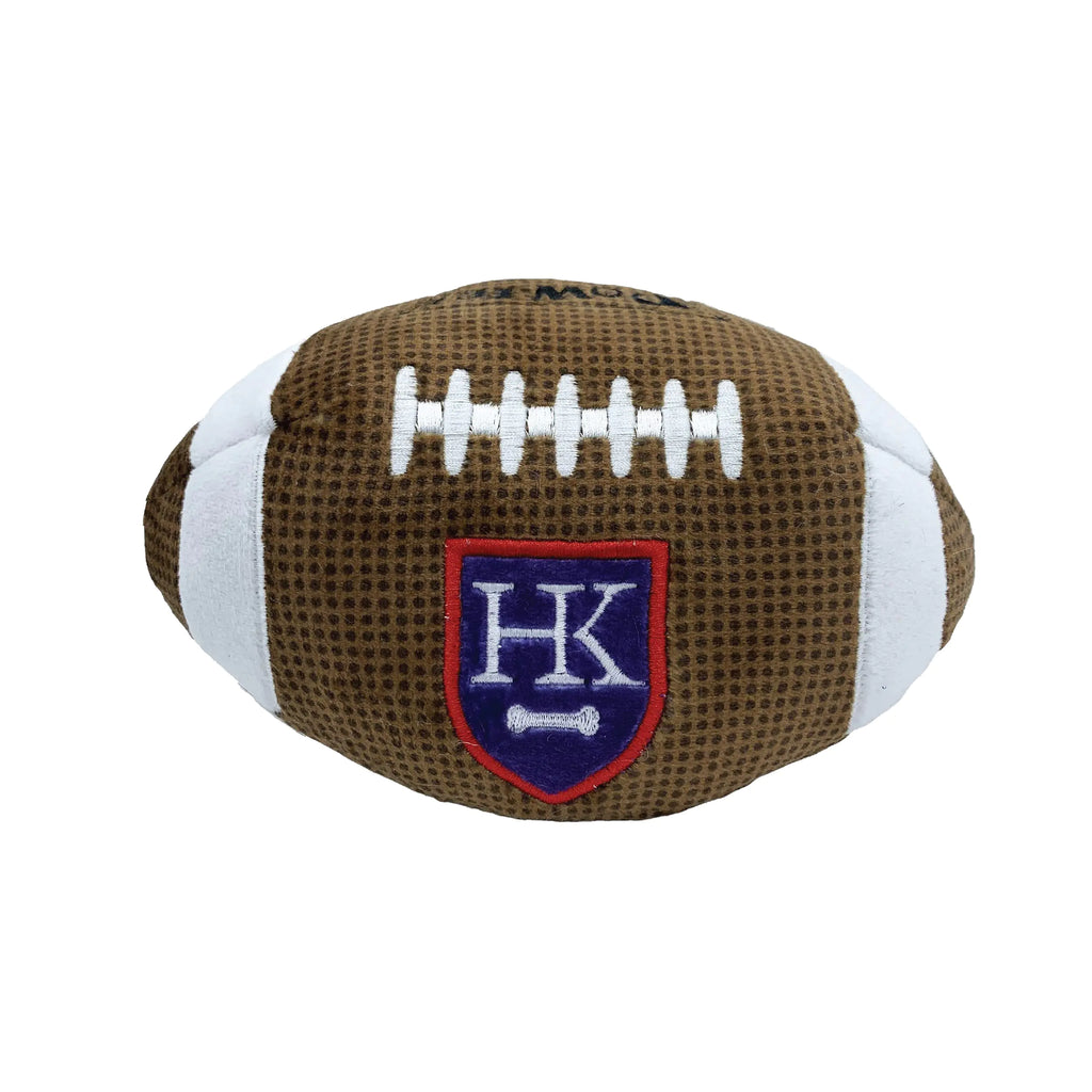 Single Huxley and Kent brown plush football with white laces and the HK shield patch