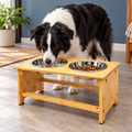 DECOMIL Bamboo Double Dog Feeding Station – dog using the bowl in a natural setting