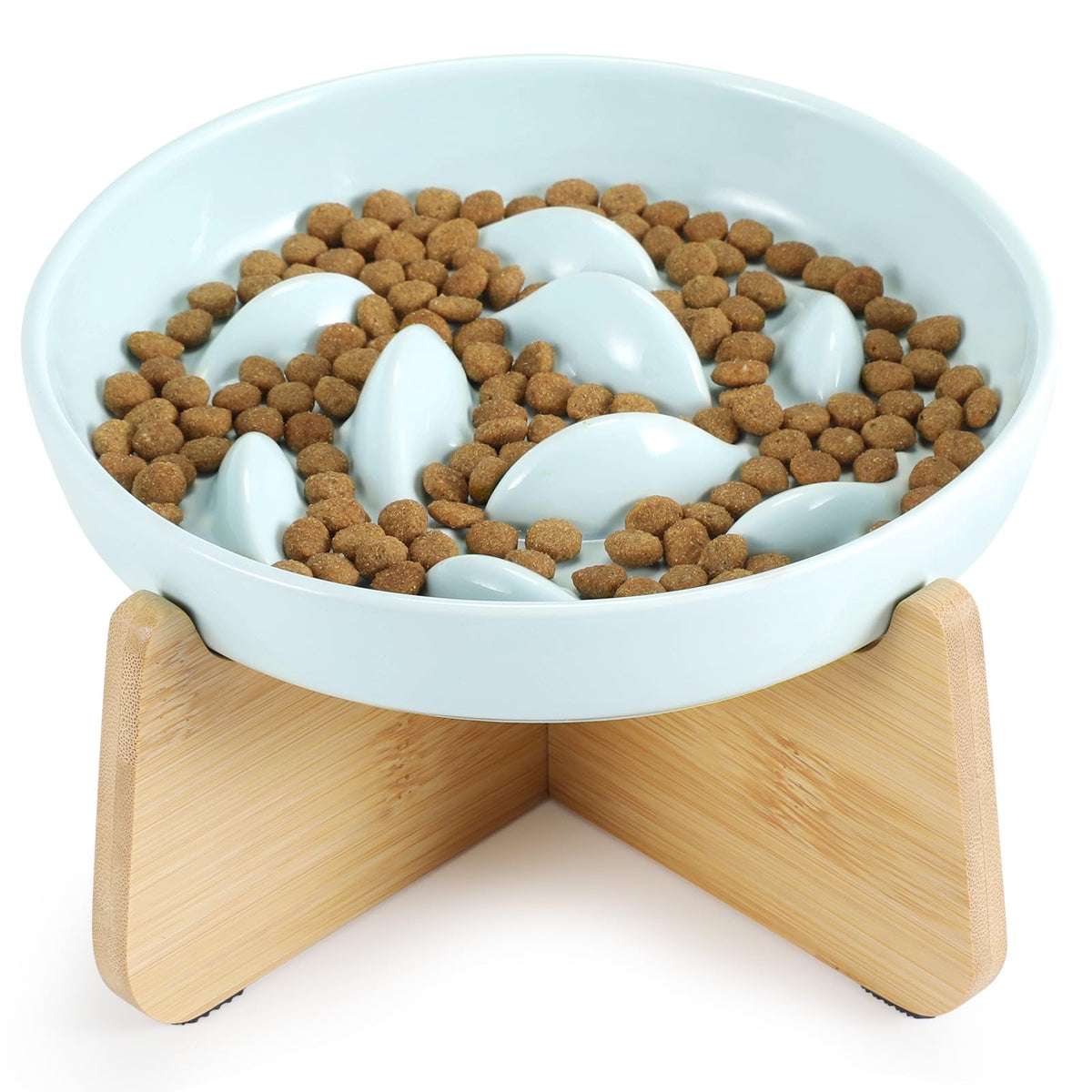 Fish-pattern ceramic cat bowl and cross-base stand on white