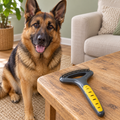 JW Pet double-row undercoat rake beside a German Shepherd