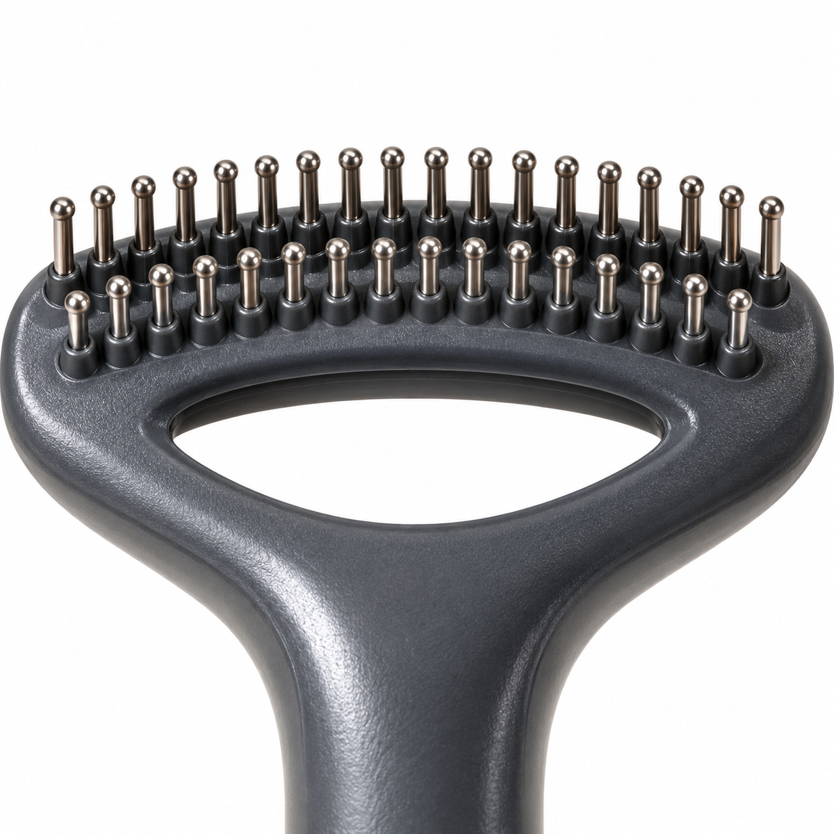 Detail of the two rows of round-tipped rake teeth