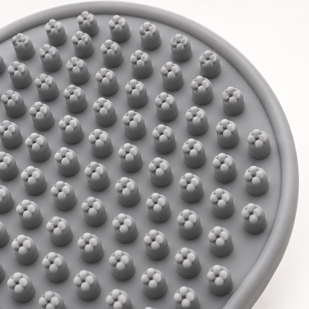 Close-up of clustered grey silicone bristle tips