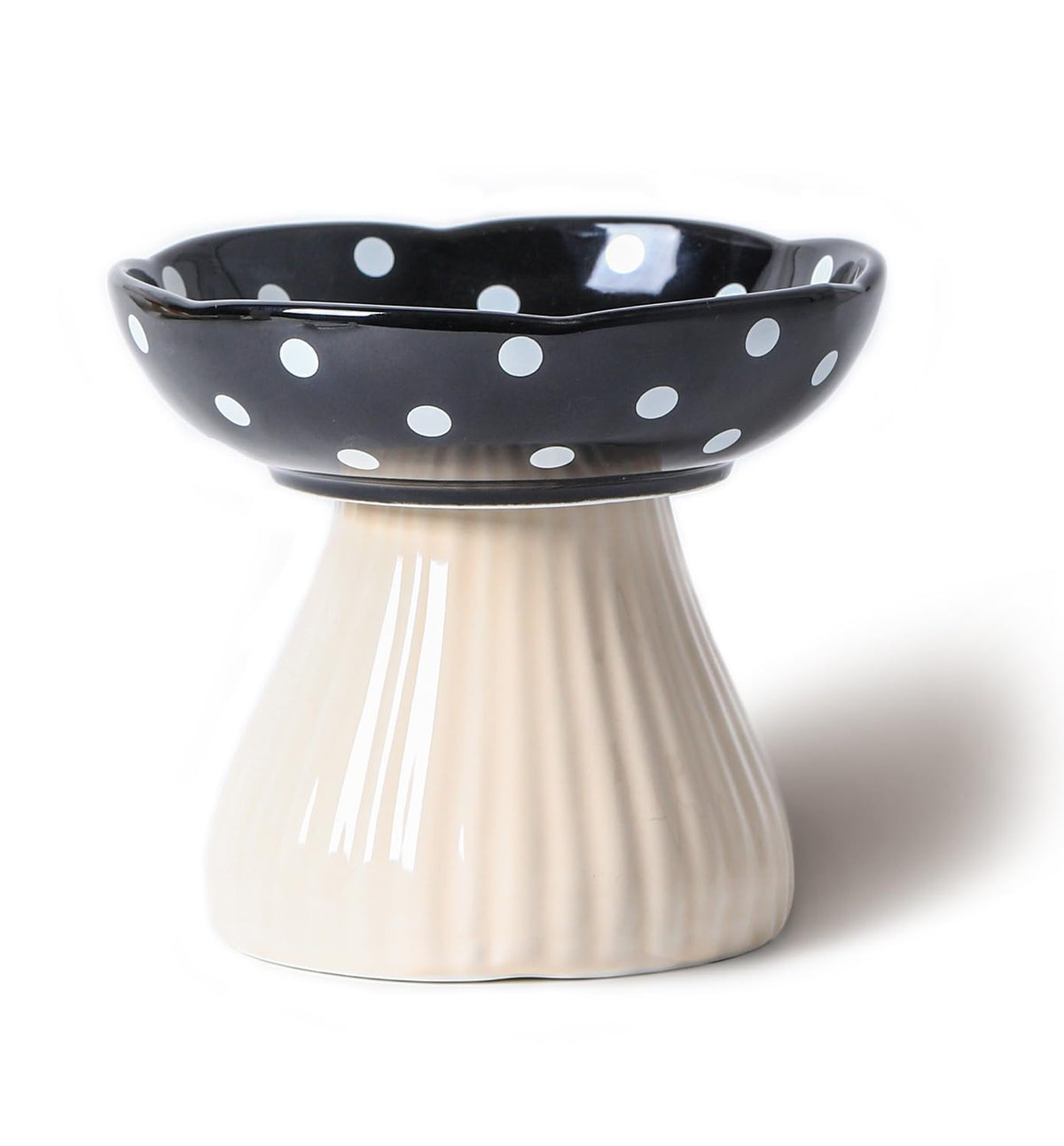 Black polka-dot ceramic mushroom bowl with cream pedestal