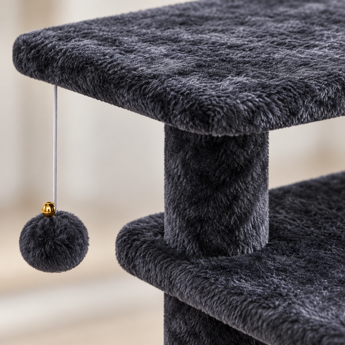 Close-up of the smoky grey plush platform, support and hanging toy ball