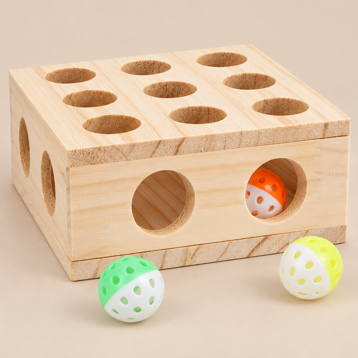Close-up of wooden puzzle holes and perforated ball