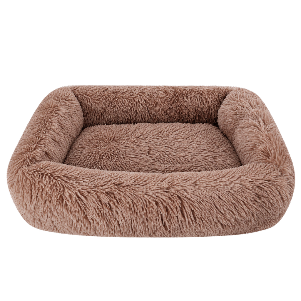 Brown fluffy dog bed isolated without animal