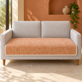 Rosygulls Striped Chenille Sofa Seat Cover – Orange, 35 × 63 in — in a living room