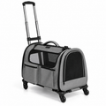 Empty grey pet carrier on wheeled base against white background