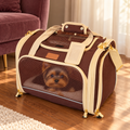 Brown PETPROVED carrier with a Yorkshire terrier resting inside in an apartment