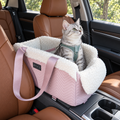 Pink PETSFIT console seat in a parked car with a small silver tabby cat