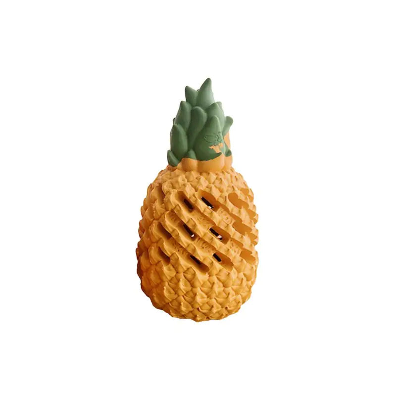 Yellow M pineapple rubber dog toy with a green leafy crown on a white background