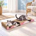ComSaf Long Cat Scratching Board 26.75"x10" Curved Foldable Cat Scratcher Duck-Shaped Cardboard Cat Scratchers Recycle Corrugate Long Cat Scratching Pad for Cat Scratch Lounge Lasting Reversible – cat and product in a home setting